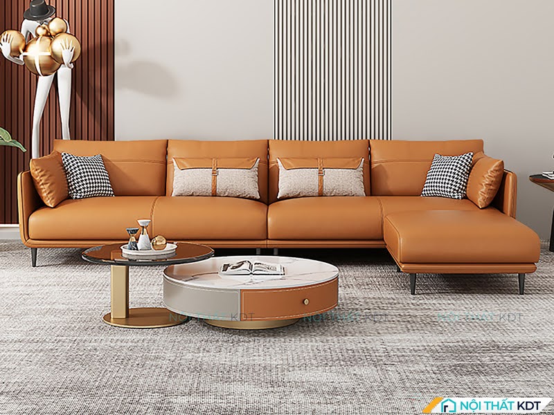 Sofa góc da cam nâu hiện đại kết hợp bàn trà độc đáo, kê sát tường tiết kiệm không gian tổng thể