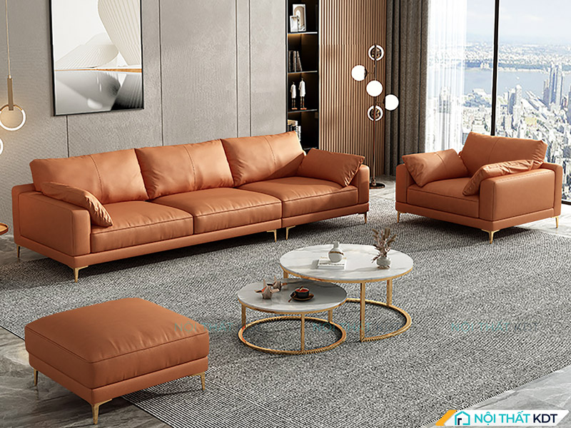 Sofa văng da 3 chỗ kê vuông góc với sofa đơn cùng đôn to