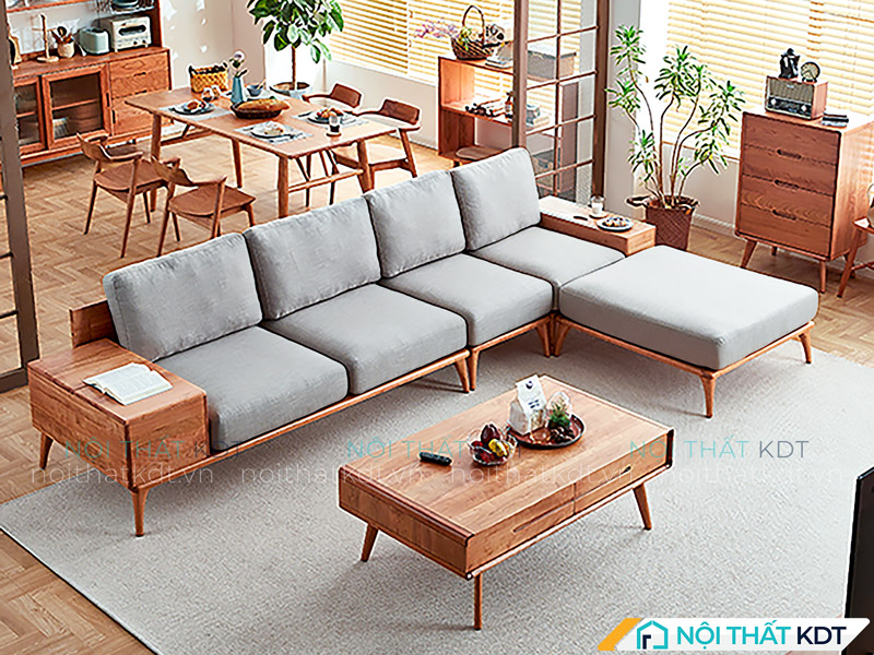 Sofa văng xanh kê giữa phòng khách mở kết hợp với đôn cùng bộ