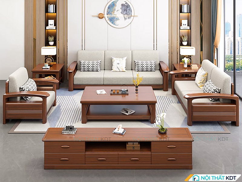 Bộ ghế sofa chữ U bố trí hài hòa trong không gian phòng khách với bàn trà và kệ gỗ 