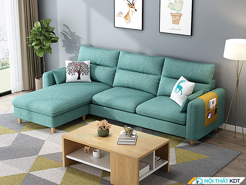 Mẫu sofa nỉ góc chữ L S33 màu xanh cổ vịt với gối ôm