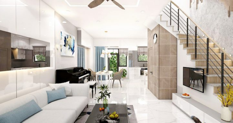 Sofa văng thanh mảnh đặt song song cầu thang giúp giữ trục nhìn thẳng, không chắn sáng và dễ bố trí nội thất xung quanh