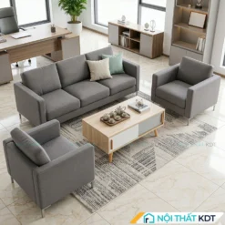 Sofa văn phòng S236 bọc nỉ màu xám bên cạnh cửa kính.